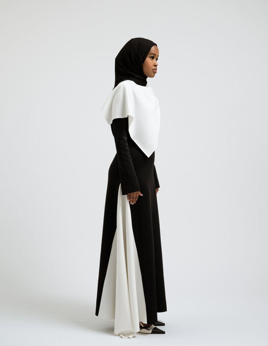 Modern modest woman wearing Elara black and white dress - Leyannaco